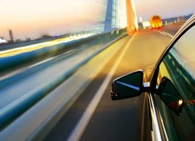 Speeding Car with sideview cameras assembled by active alignment