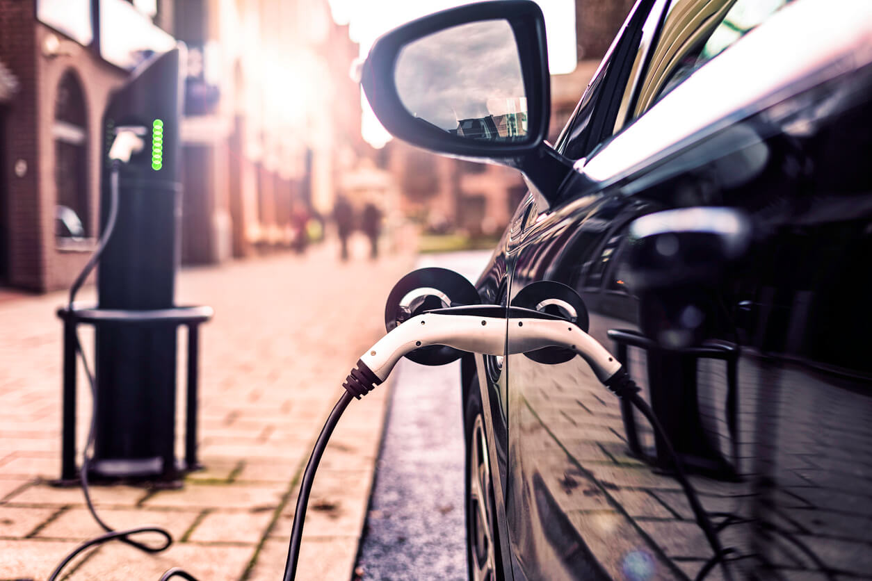 Electric car at charging station