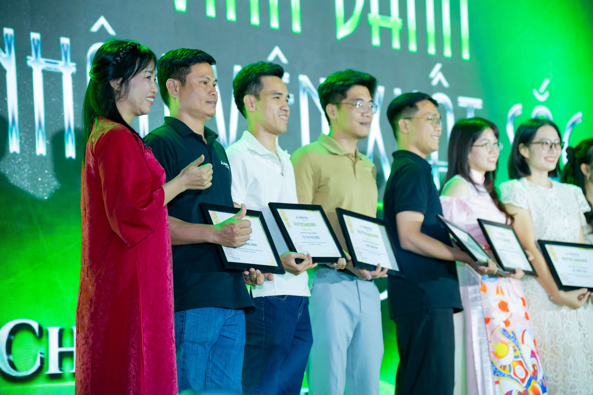 Employees receiving awards at the Averna Star Ceremony in Vietnam