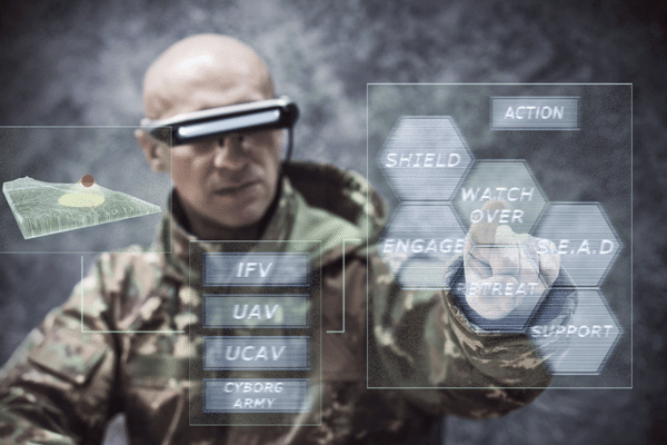 Image of a soldier using an AR device and headset