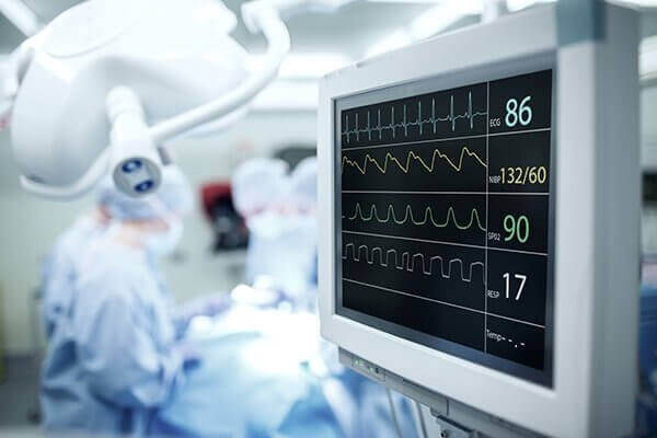 Operating room with Vitals monitor displaying patient stats