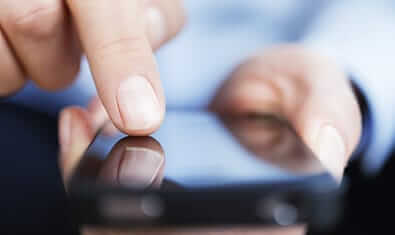 Fingers swiping on a smart device
