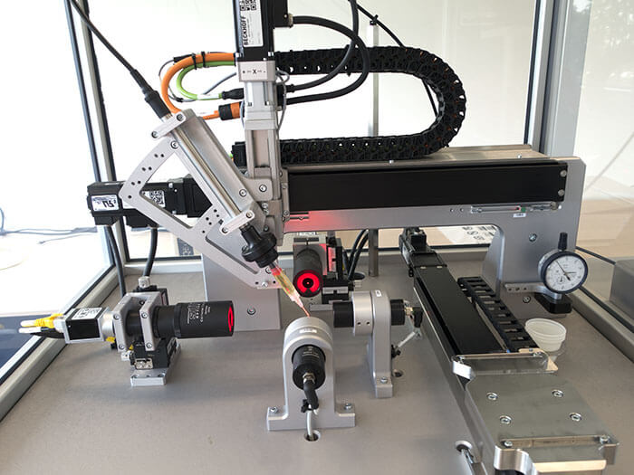 Table top vision-guided precision assembly system